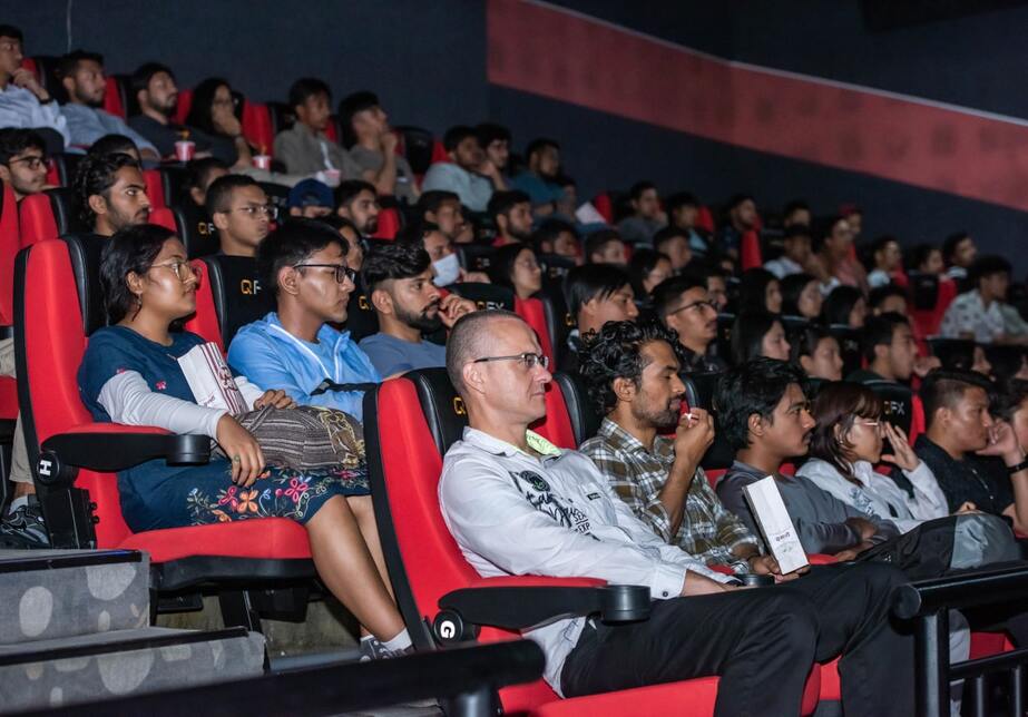An enthusiastic seated audience looks over the presentations An enthusiastic seated audience looks over the presentations