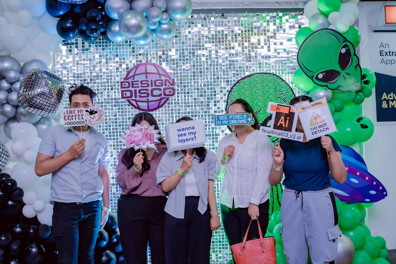 Happy participants posing for for a disco themed photo-op. Happy participants posing for for a disco themed photo-op.